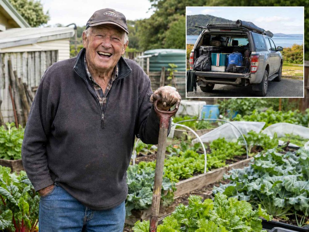 A gardener leaning on a spade among raised vegetable beds, with a ute packed for the ferry to Stewart Island